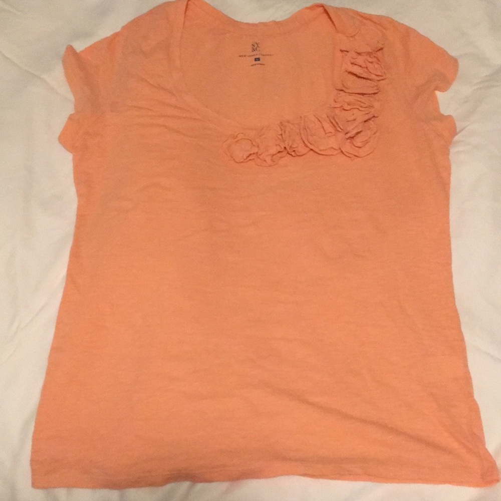 Peach/light orange embellished tee shirt.